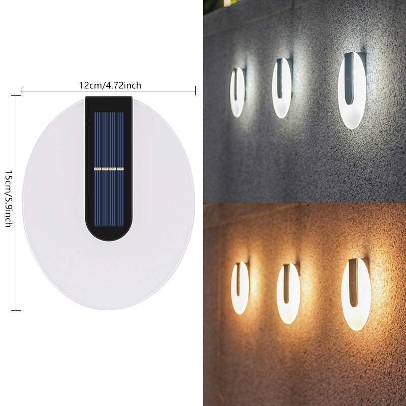 Waterproof Solar Outdoor Yard solar light on a wall, showcasing its design and dimensions.